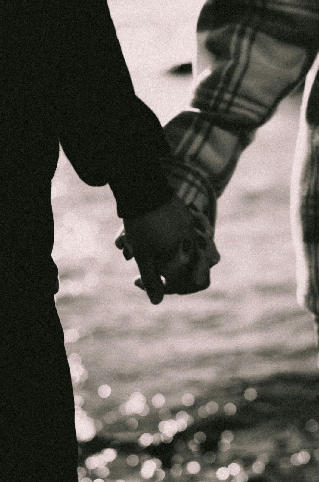 A black-and-white close-up of two people holding hands. Complex PTSD can make it difficult to trust or feel safe in relationships, even with those closest to you. Relational trauma therapy in Palm Beach, FL, can help you rebuild secure, healthy connections.