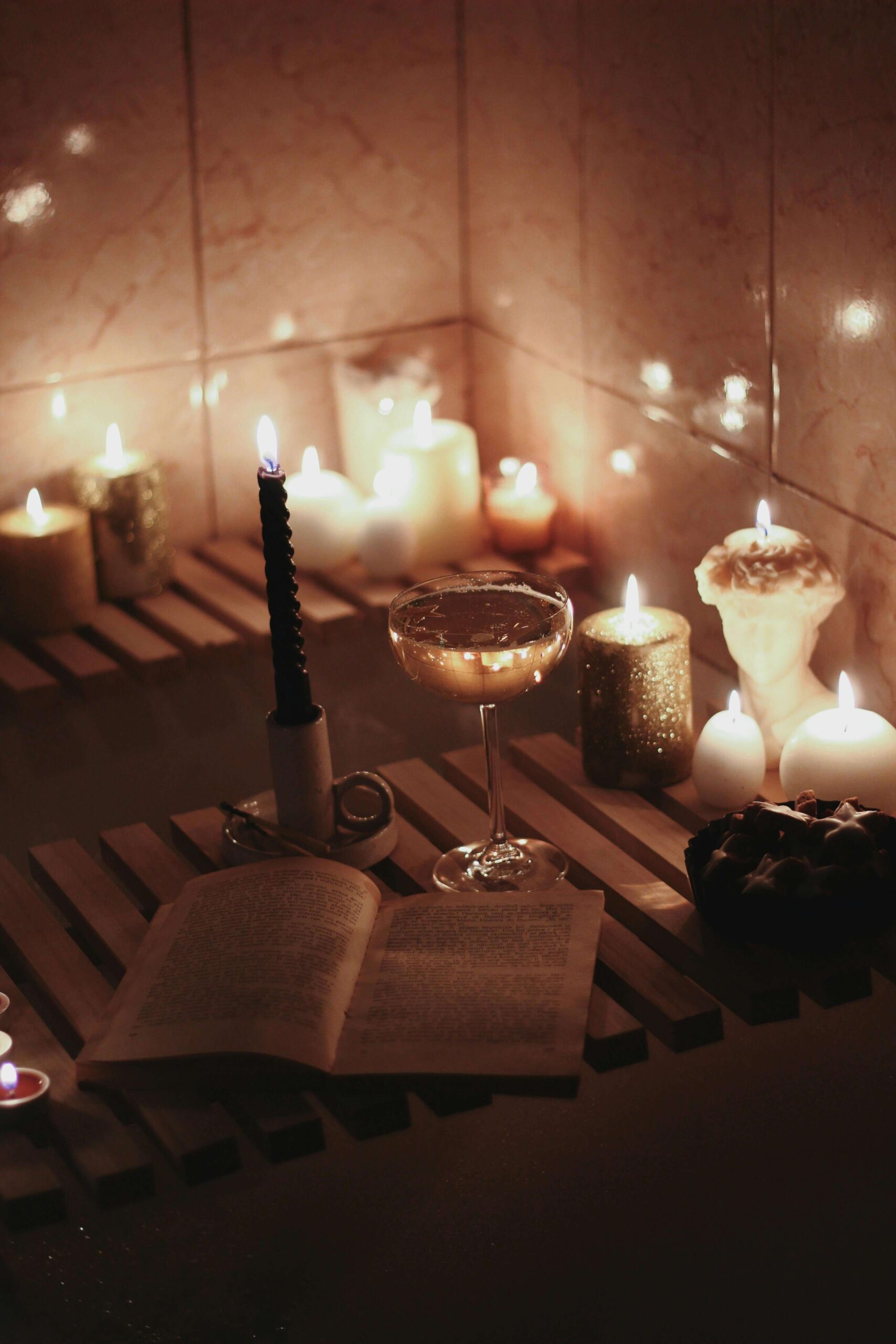 A wooden bath tray in a warmly lit bathroom. Is allowing yourself to truly rest without guilt something that feels impossible? Relational trauma therapy in Palm Beach, FL can help you heal the wounds that make stillness feel threatening.