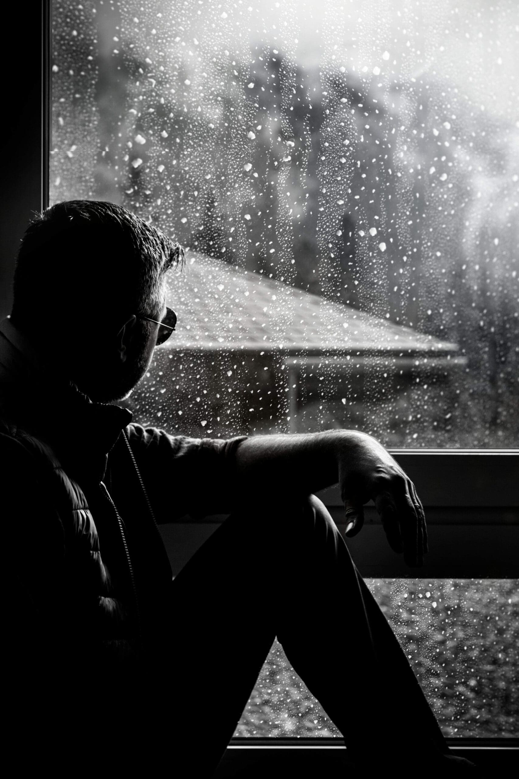 Man’s silhouette | betrayal trauma palm beach | relational trauma therapy | online trauma therapy | Palm Beach, Florida | Boca Raton | Flamingo Park | Northwood Shores | Worth Avenue A man sits alone in silhouette, staring out of a window. Have you experienced betrayal trauma that has shattered your sense of safety and trust? A relational trauma therapist in Palm Beach, FL can help you process the pain and begin rebuilding.