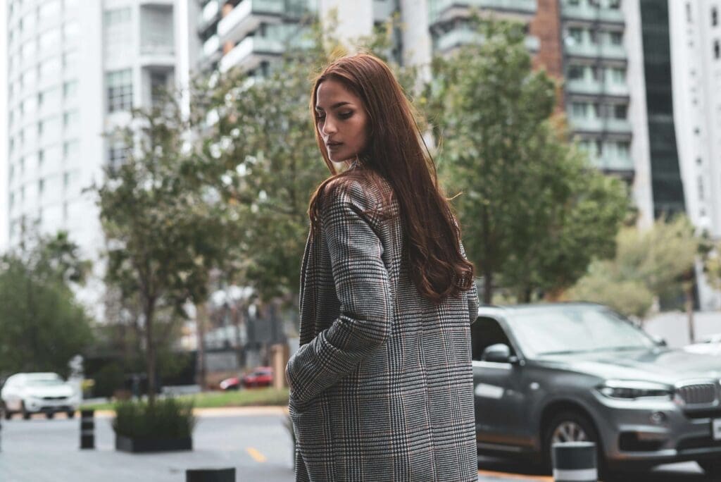 A woman glances back with a pensive expression. Is unresolved trauma making it impossible to feel heard, no matter how clearly you try to communicate? A relational trauma therapist in Palm Beach, FL can help you identify what's really happening beneath the surface.