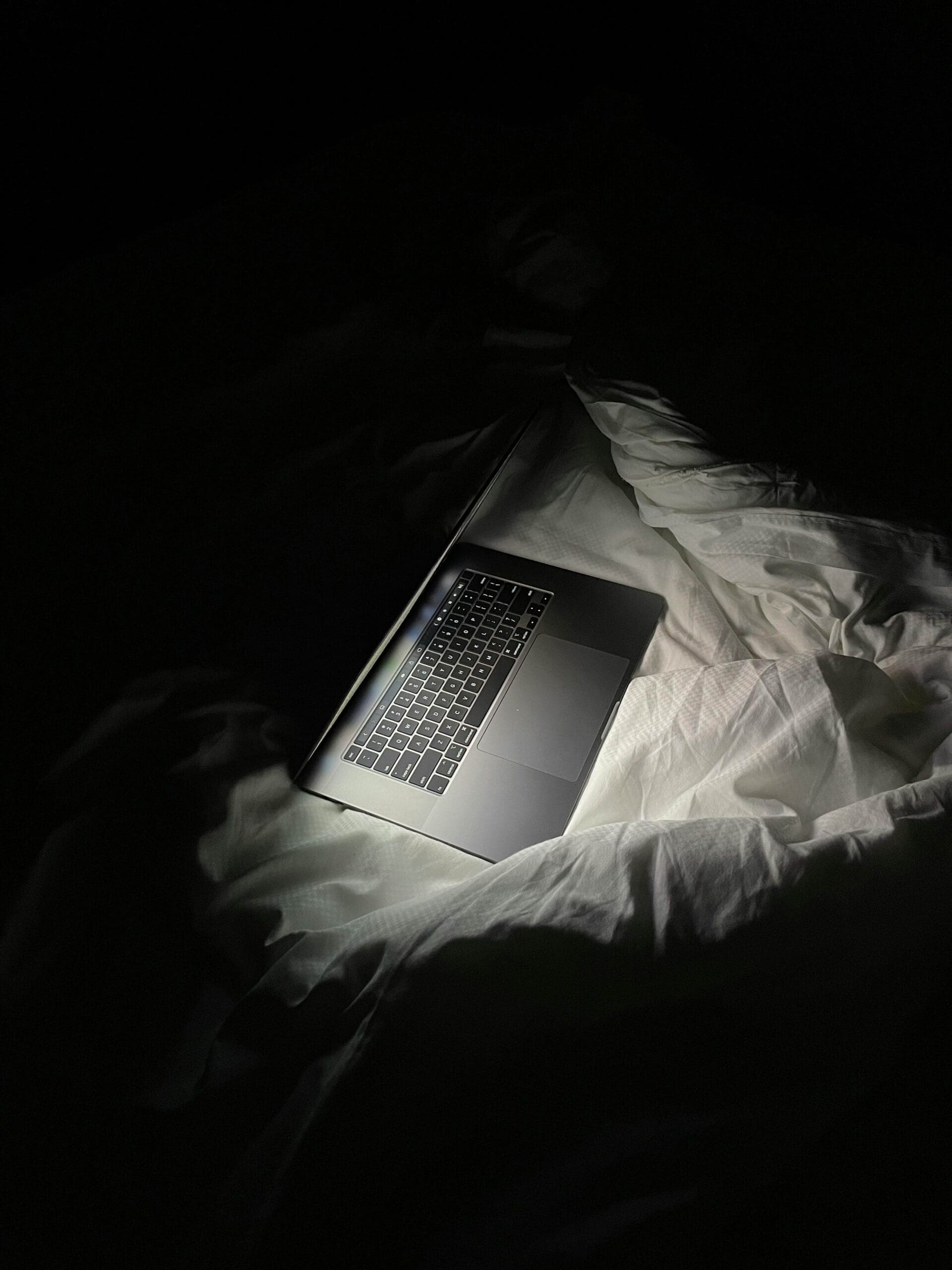 Open laptop | betrayal trauma palm beach | online relational trauma therapy | relational trauma therapist | Palm Beach, Florida | Jupiter | Palm Beach Gardens | Wall Street South | Whitehall An open laptop glows in the darkness of a rumpled bed. Does betrayal keep you awake at night, replaying moments and searching for answers that don't come? A relational trauma therapist in Palm Beach, FL can help you find rest and relief from the relentless mental spiral.