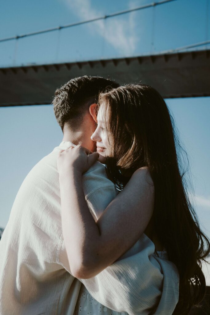 A couple embraces tightly. Could past experiences make asking for help feel unsafe, even in close relationships? An online relational trauma therapist in Palm Beach, FL can help you explore where that fear comes from.
